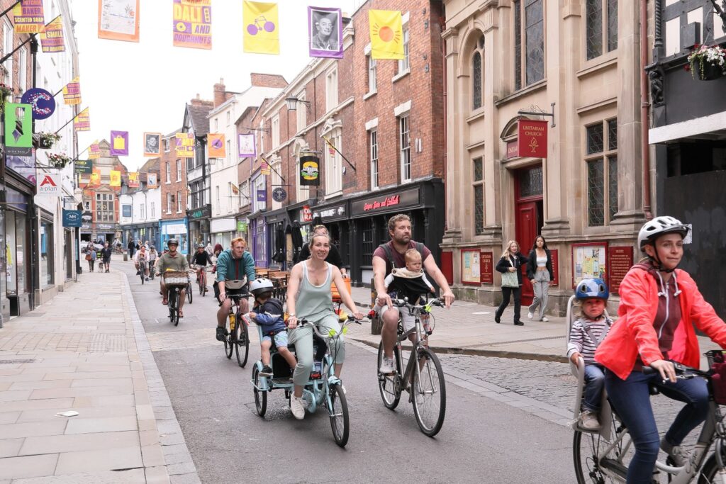 A picture of people riding bikes in Shrewsbury town centre.